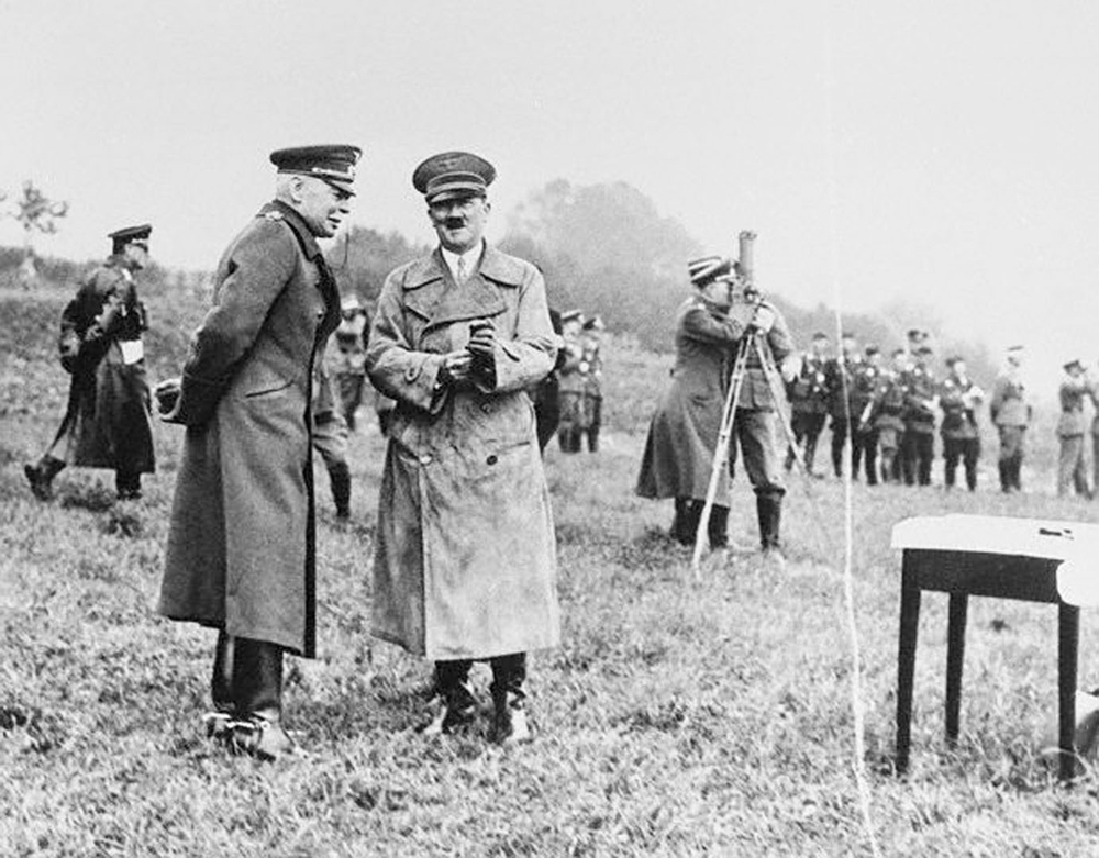 Adolf Hitler in conversation with Hans von Seeckt during a visit of a command post during Wehrmacht maneuvers